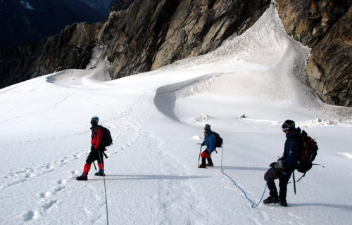 Travelers en-route to the highest peak of Rwenzori mountain ranges.