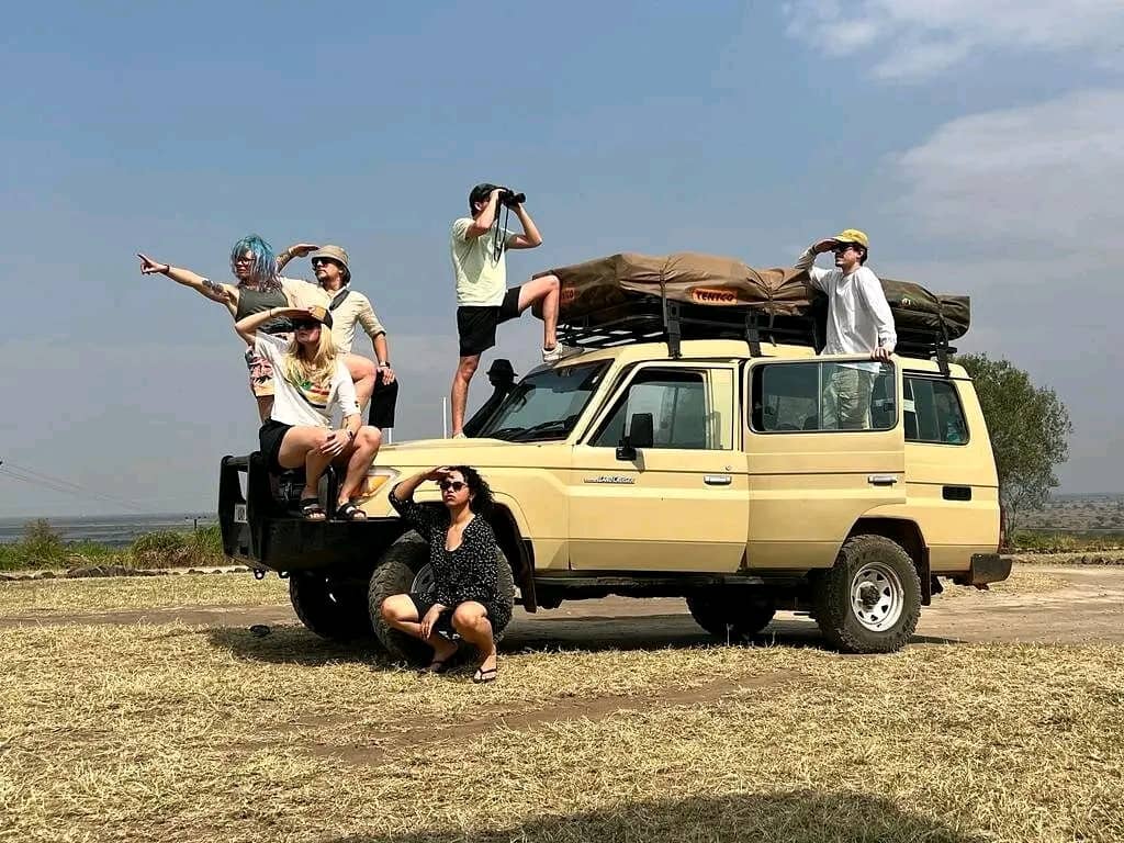 7-9 seater 4x4 Land Cruiser with pop-up roof perfect for game drive safaris. From US$ 180 per day excluding fuel